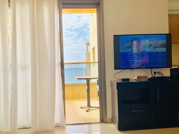 Family Apartment, 3 Bedrooms, Sea View | Television - King David Apartment on the Sea (Netanya)