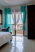 Family Apartment, 3 Bedrooms, Sea View | 3 bedrooms, desk, soundproofing, iron/ironing board