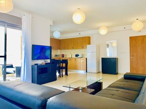 Family Apartment, 3 Bedrooms, Sea View | Living area | Flat-screen TV - King David Apartment on the Sea (Netanya)
