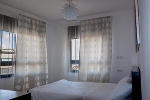 Family Apartment, 3 Bedrooms, Sea View | 3 bedrooms, desk, soundproofing, iron/ironing board