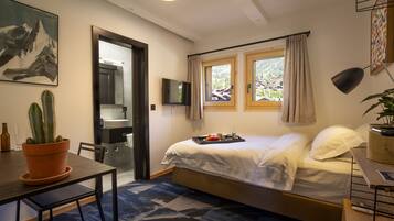 Premium bedding, blackout curtains, soundproofing, free WiFi