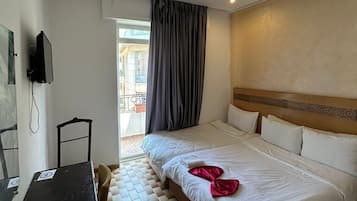 Desk, laptop workspace, free WiFi, bed sheets