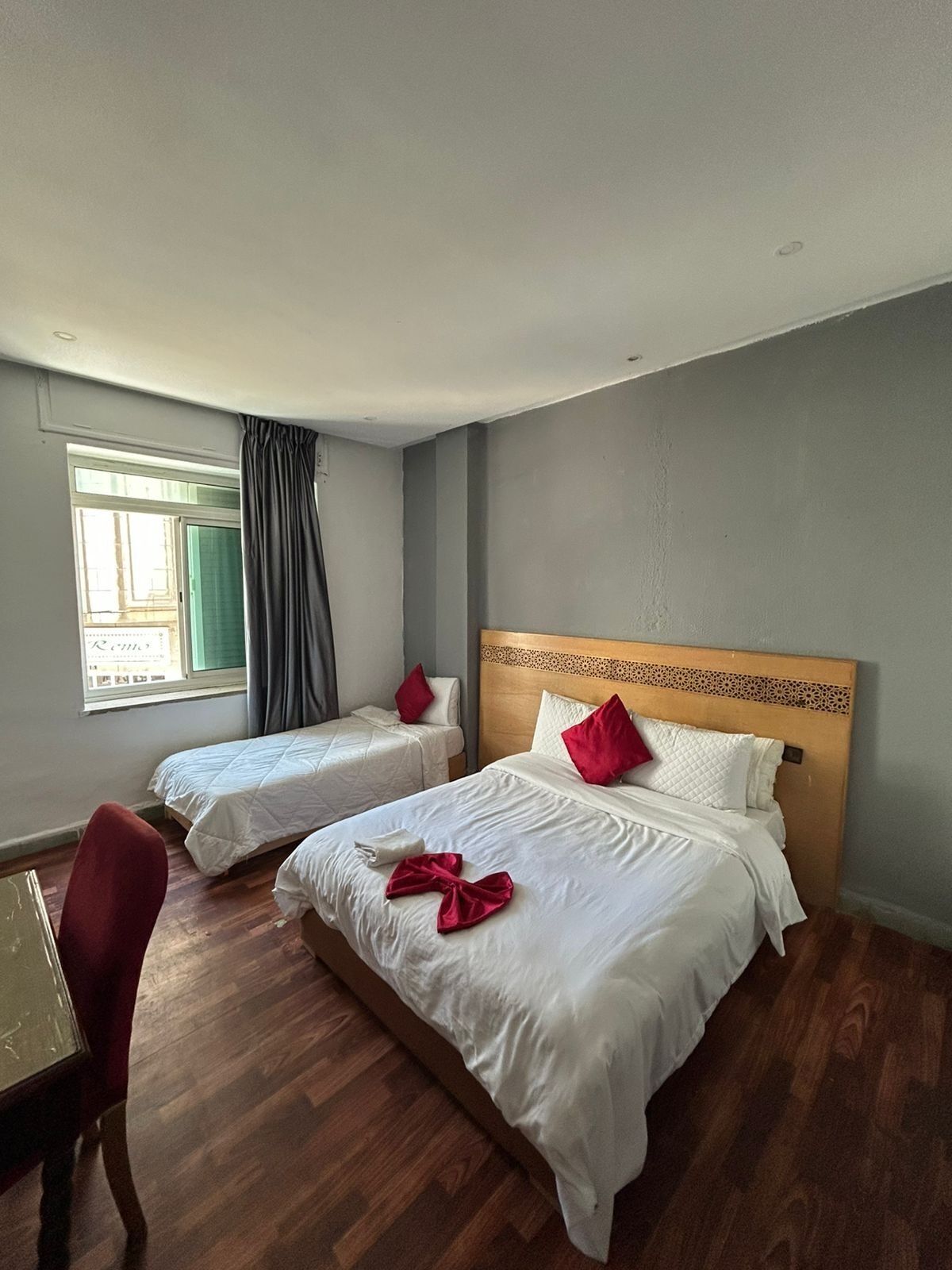 Desk, laptop workspace, free WiFi, bed sheets
