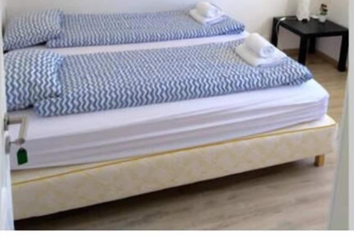 Double or Twin Room, Shared Bathroom (G7) | Blackout drapes, free cribs/infant beds, free WiFi, bed sheets