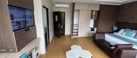 Deluxe Suite, Non Smoking | Hypo-allergenic bedding, down comforters, minibar, in-room safe