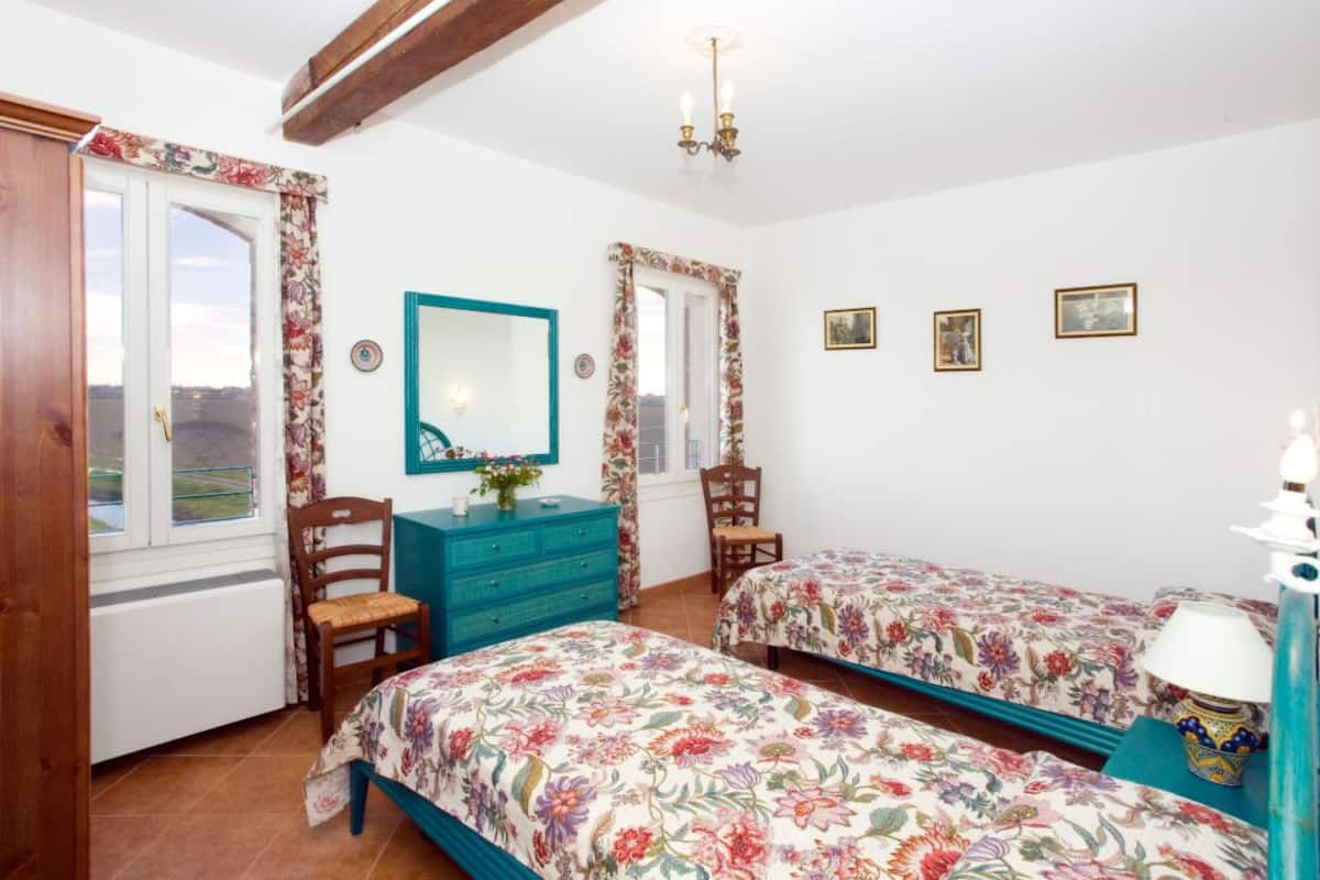 Apartamento, 2 habitaciones, 2 baños, vistas al jardín (Pavoncella) | 1 dormitorio, sistema de insonorización, wifi gratis y ropa de cama