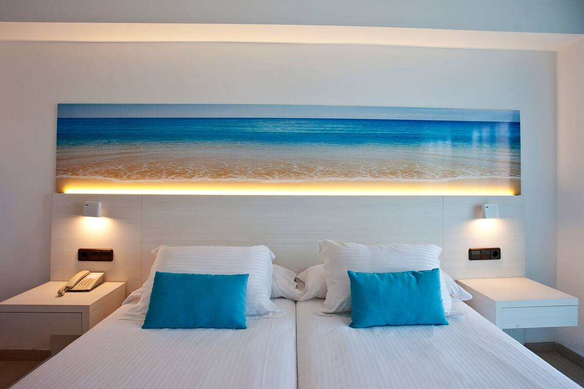 In-room safe, WiFi (surcharge), bed sheets
