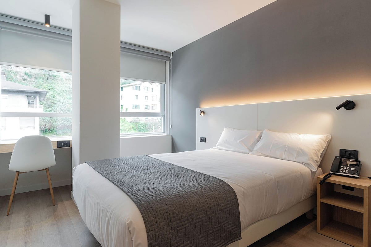 Single Room | Coffres-forts dans les chambres, rideaux occultants