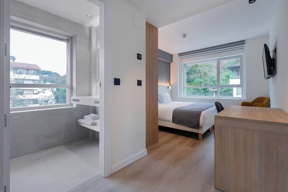 Double Room | Coffres-forts dans les chambres, rideaux occultants