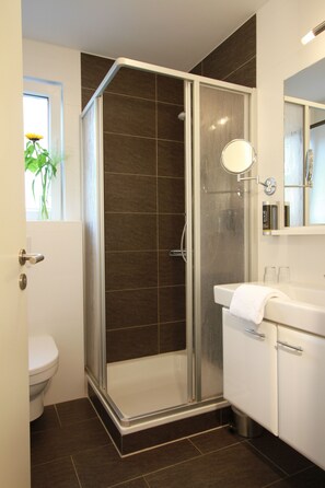 Shower, free toiletries, hair dryer, towels