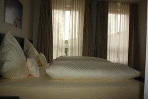 Coffres-forts dans les chambres, rideaux occultants