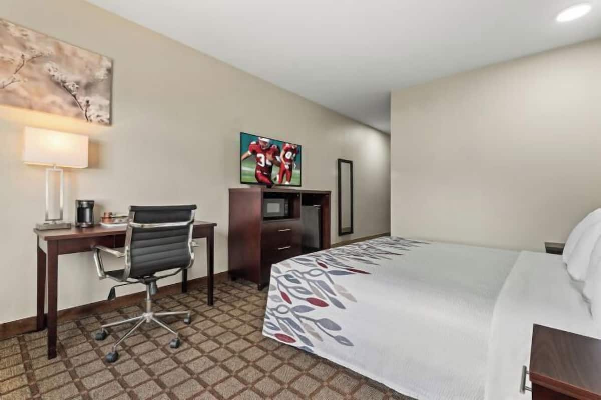 Desk, blackout drapes, iron/ironing board, free cribs/infant beds