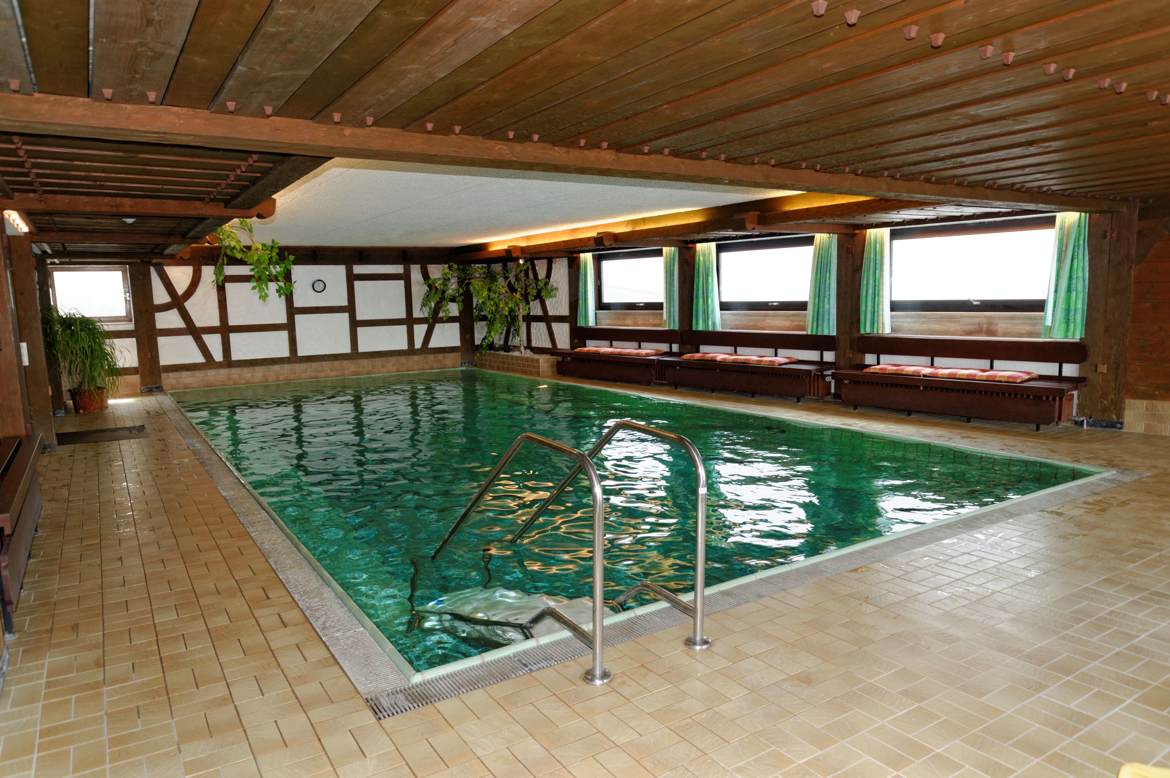 indoor pool, open 8:00 am to 9:00 pm, pool loungers