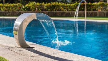 2 outdoor pools, open 11:00 AM to 5:00 PM, pool umbrellas, sun loungers