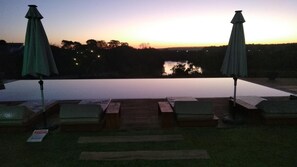 Outdoor pool, open 8:00 AM to 8:00 PM, sun loungers