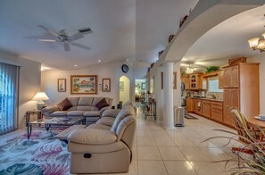 TV, DVD player, books, stereo - Family-Friendly Pool Retreat for You & Your Fur Baby 🐾 | Villa Hideaway – Roelens Vacations (Cape Coral)