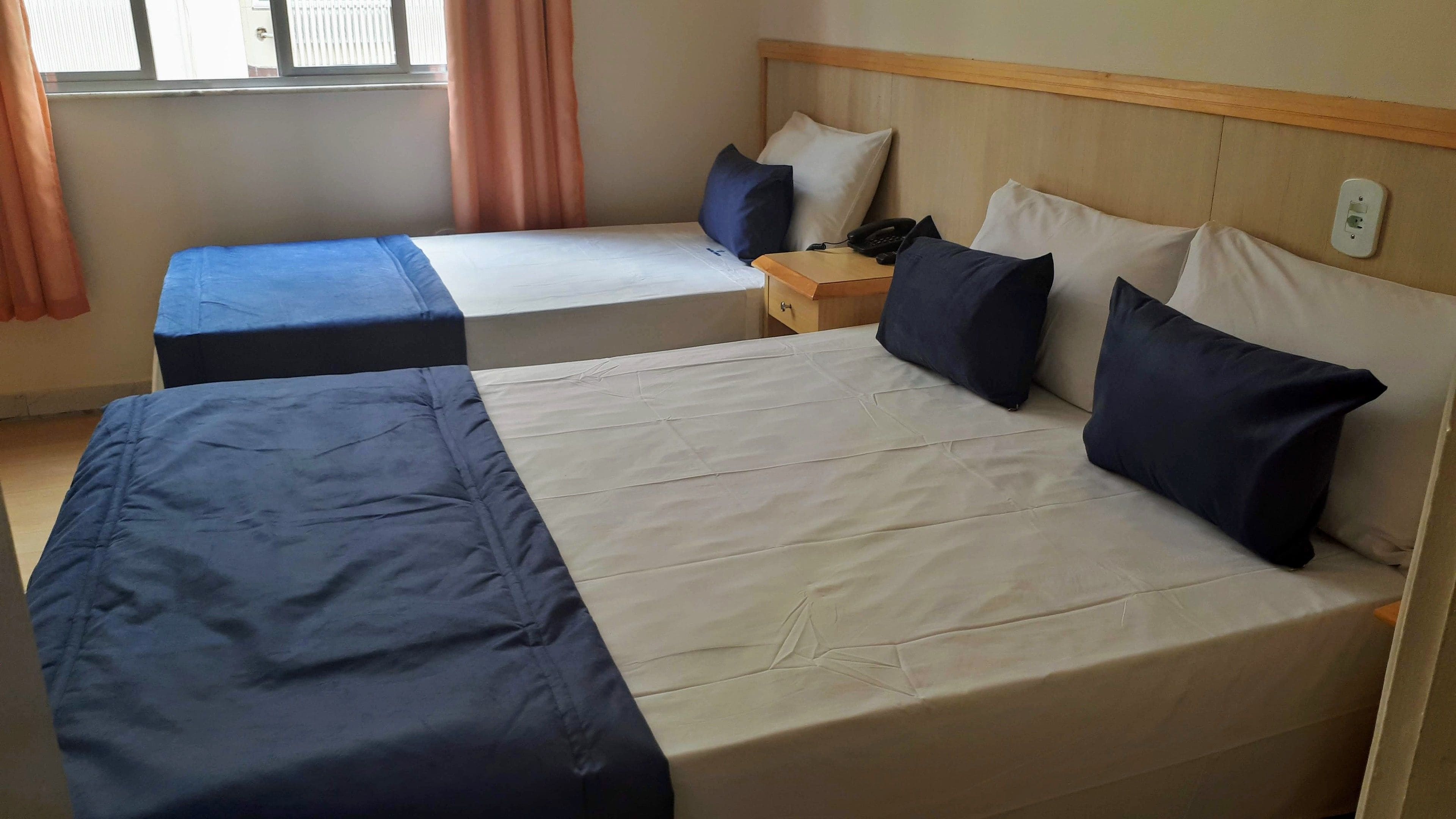 triple room, multiple beds, non smoking | minibar, blackout curtains, iron/ironing board, free wifi