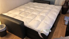 1 bedroom, desk, iron/ironing board, travel crib