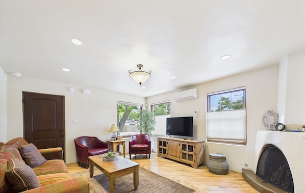 TV, fireplace - Historic Charm Meets Modern Elegance (Santa Fe)