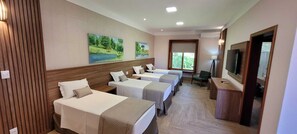 EXTERNO PREMIUM QUADRUPLO SOLTEIRO | Minibar, wi-fi (inkludert) og sengetøy