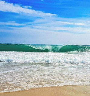A beach with waves and a clear sky. - Oceanfront 6BR, 5BA Corolla retreat with beach access, hot tub, and pool. WH-39 (Corolla)