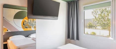 Habitación doble | Escritorio, cortinas blackout, insonorización y wifi gratis