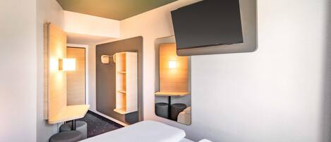 Desk, blackout drapes, soundproofing, free WiFi