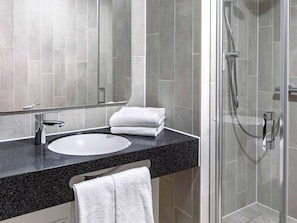 Shower, towels, soap, shampoo