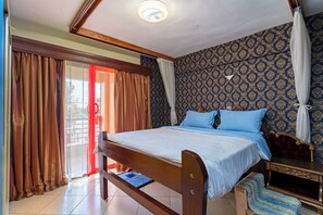 Family Apartment, 1 Bedroom | 1 bedroom, desk, blackout drapes, iron/ironing board