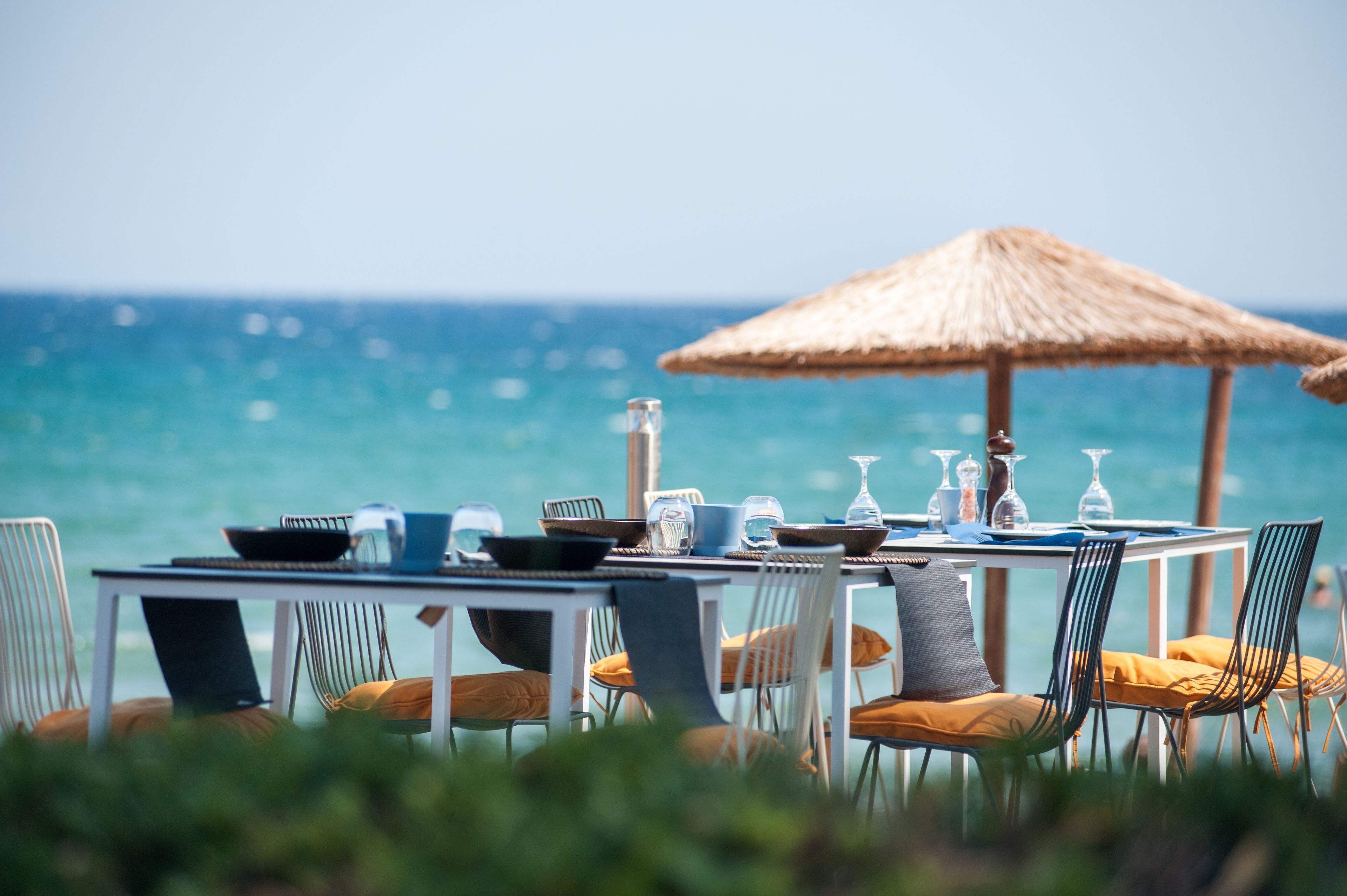 on the beach, sun-loungers, beach umbrellas, beach towels