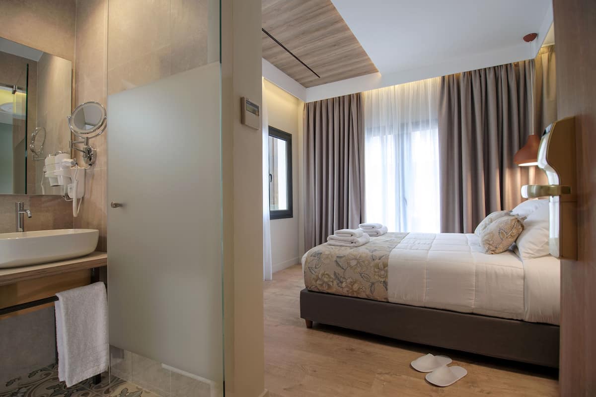 city double or twin room, city view | in-room safe, blackout curtains, soundproofing, iron/ironing board