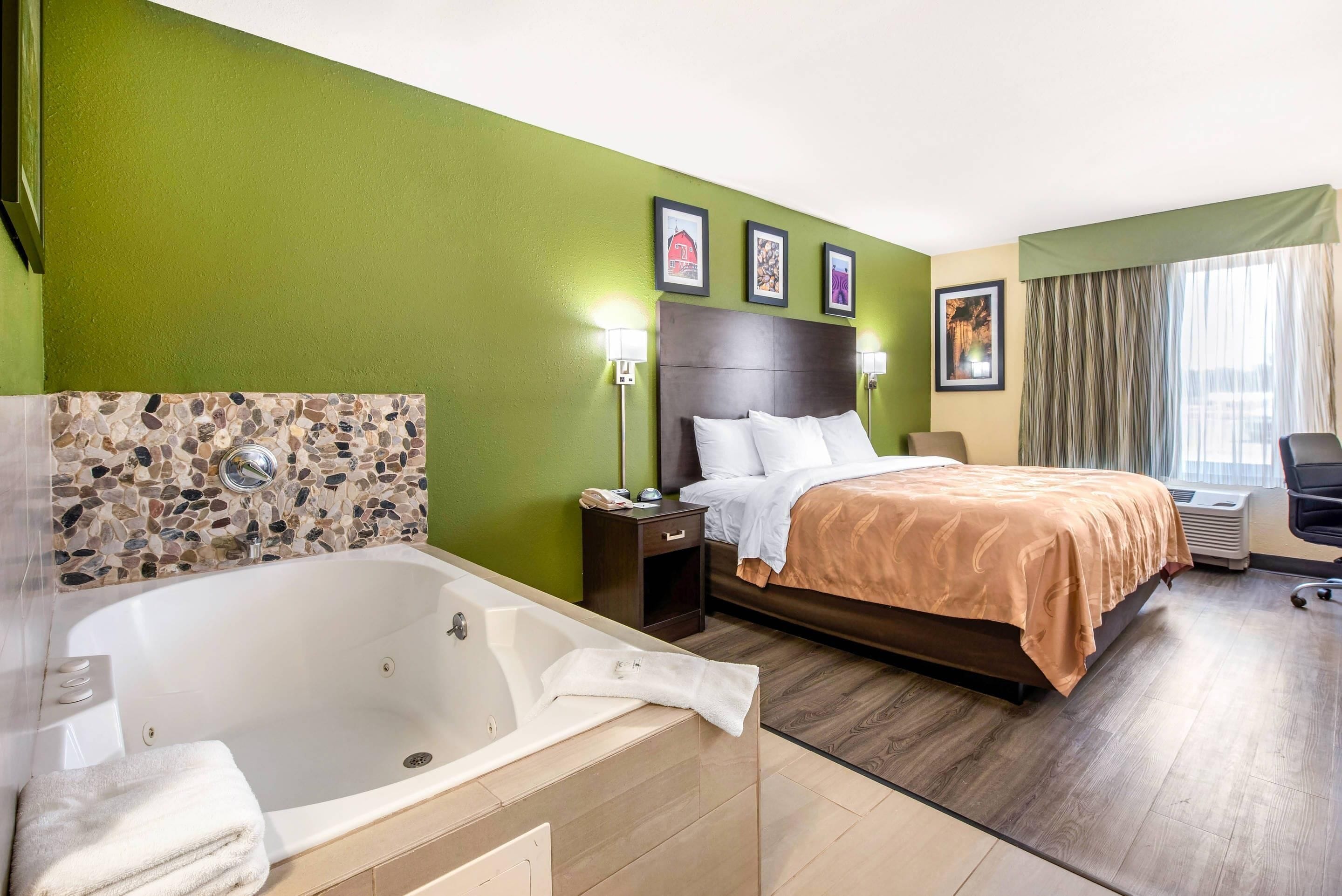 Hypo-allergenic bedding, desk, laptop workspace, blackout curtains