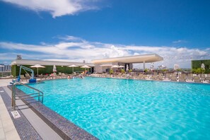 Outdoor pool, pool umbrellas, pool loungers