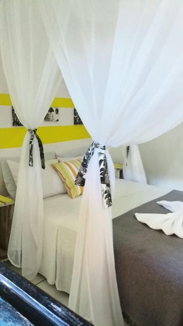 Minibar, blackout curtains, iron/ironing board, free WiFi - Magia DAjuda Hospedagem (Porto Seguro)