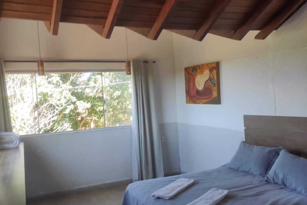 Suíte Arvoredo - Pousada Quinta dos Quintais | 1 quarto, roupas de cama premium, individualmente decorados