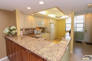 Fridge, microwave, oven, stovetop - SST1-702 Beautifully Renovated Beachfront Condo with all of the Amenities! (Marco Island)
