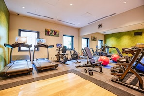 Stay fit on the go with our fully equipped gym featuring treadmills, stationary bikes, and weightlifting equipment.