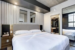 1 habitación, camas con efecto memoria y tabla de planchar con plancha 