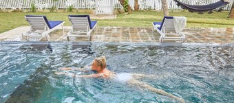 Beautiful house, gorgeous pool - absolutely beach front on a lovely surf beach!