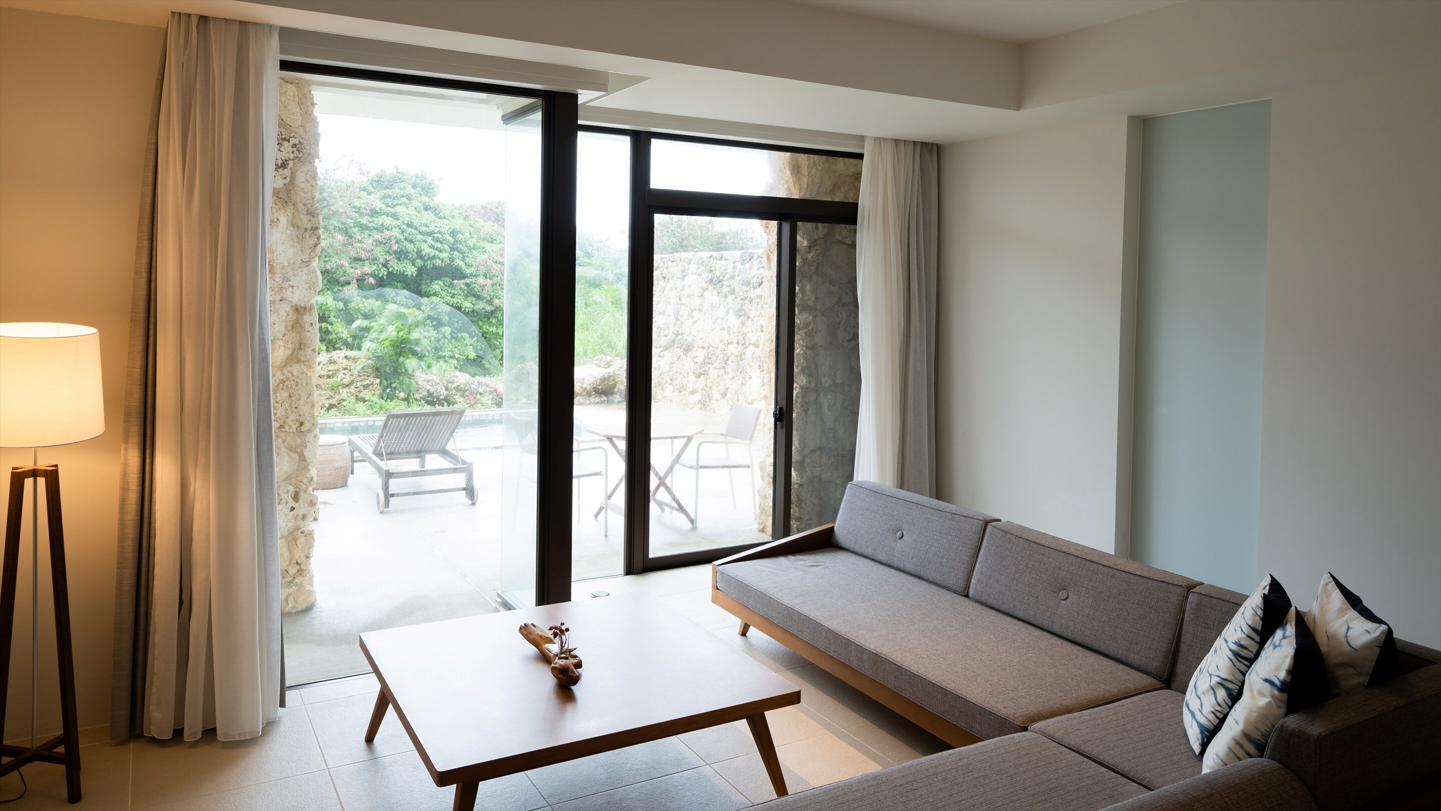 comfort villa, quad room | living area | flat-screen tv