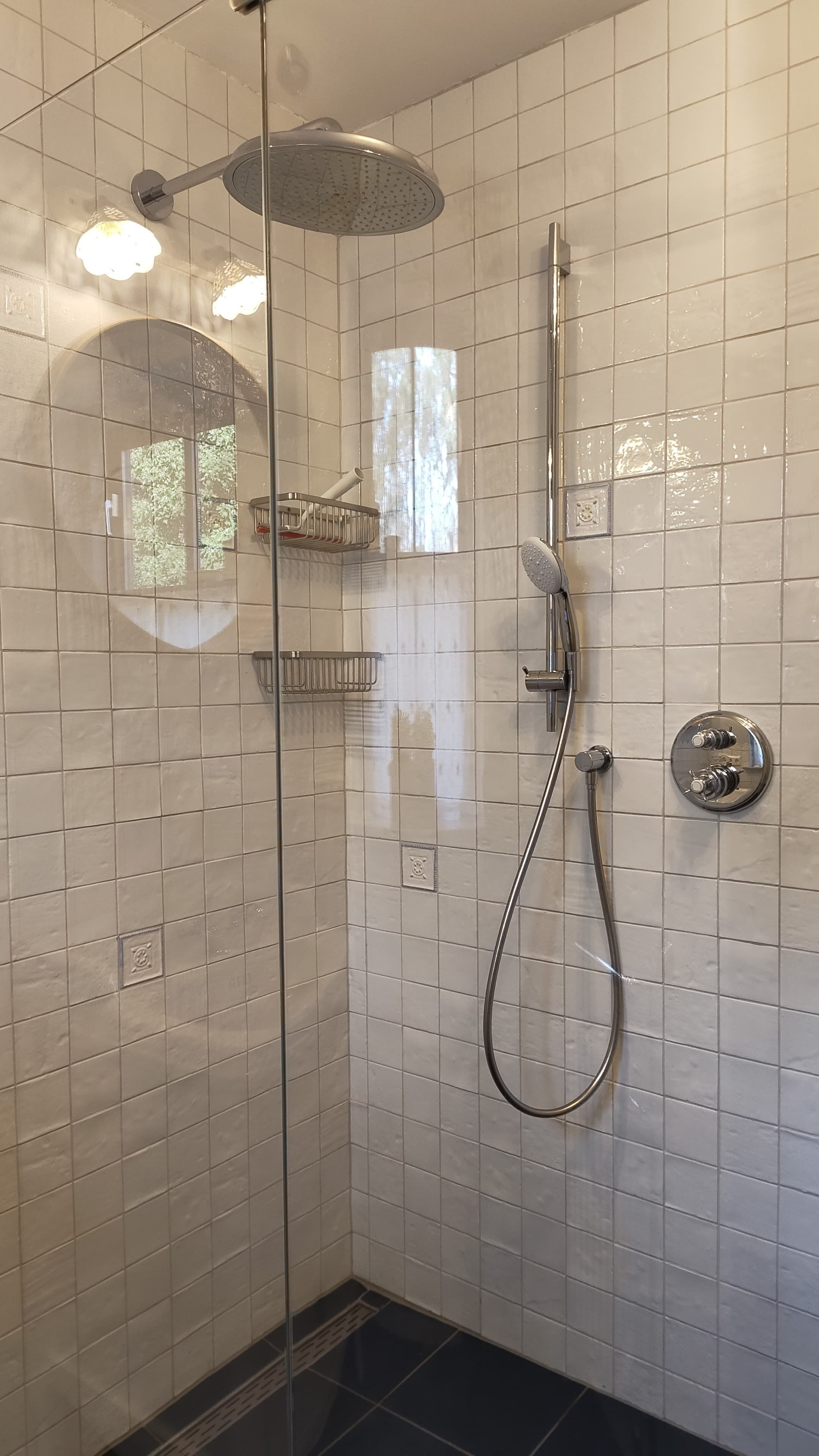 Shower, hair dryer, towels, toilet paper