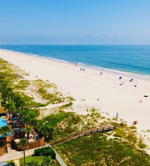 On the beach, sun-loungers, beach towels