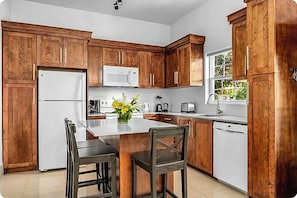 Fridge, microwave, oven, stovetop - Sun Villa @ The Sun and Sea Villas, a cozy home near the Long Bay Beach. (Long Bay)