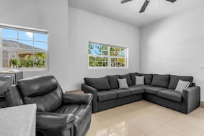 Smart TV, fireplace, books - Sun Villa @ The Sun and Sea Villas, a cozy home near the Long Bay Beach. (Long Bay)