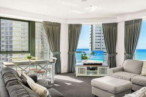 Deluxe Apartment, 3 Bedrooms, Ensuite, Ocean View | Living area - Holiday Holiday Sun City Apartments (Surfers Paradise)