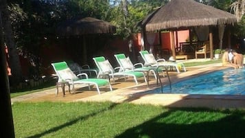 Outdoor pool, open 9:00 AM to 6:00 PM, pool umbrellas, sun loungers