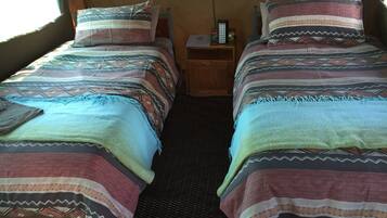 Tomannsrom | Strykejern/-brett og ekstrasenger (mot et tillegg)