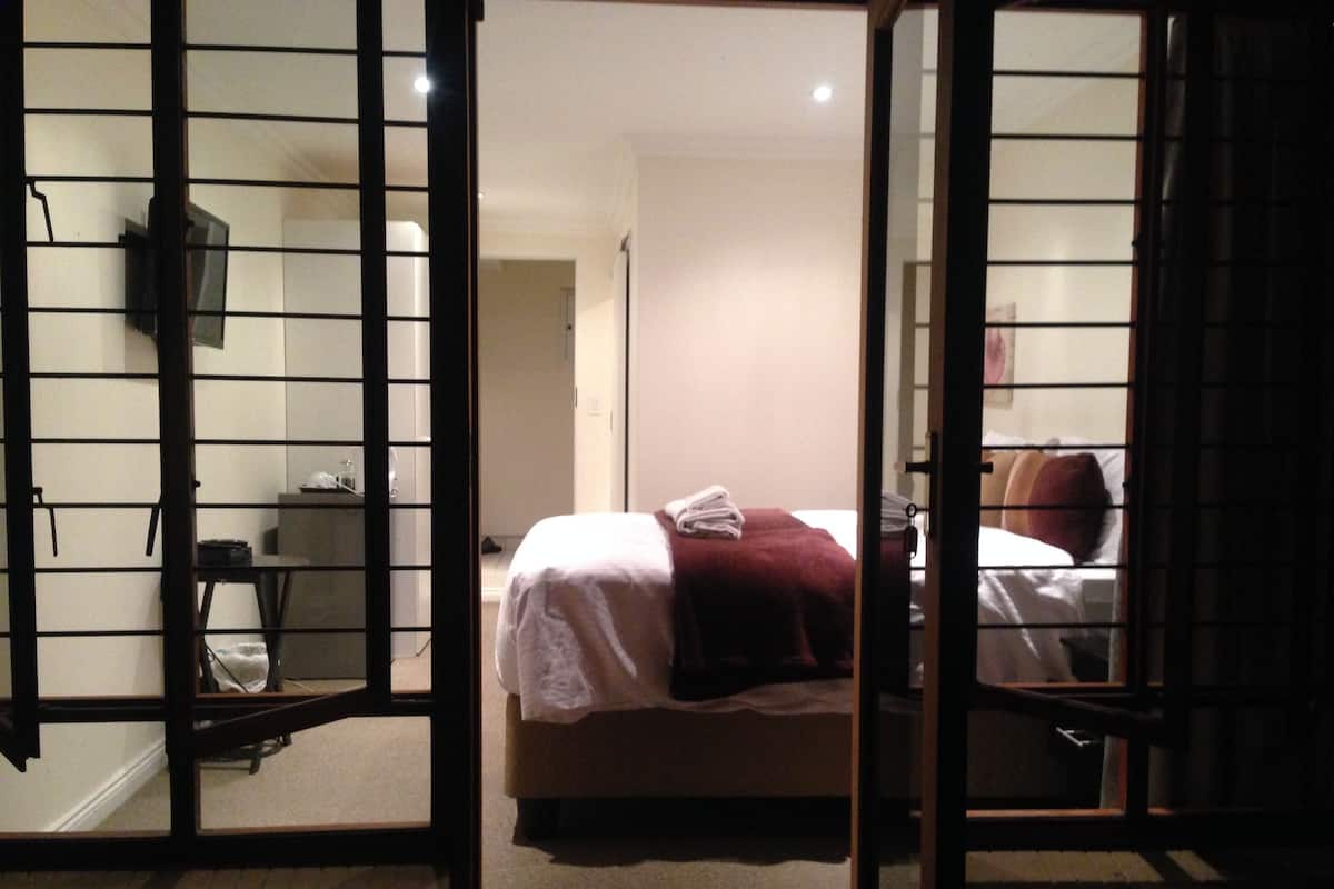 Exclusive Double Room, Private Bathroom, Pool View | In-room safe, individually furnished, iron/ironing board