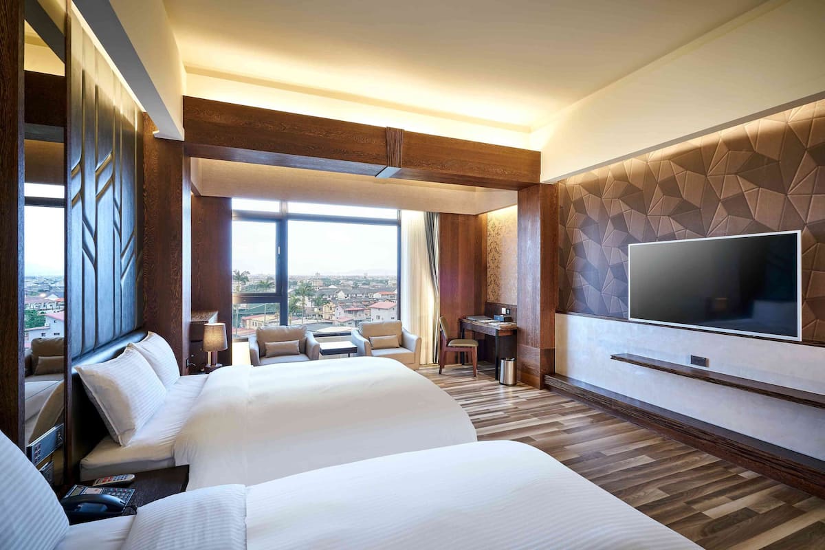 superior quadruple room | premium bedding, down duvets, pillow-top beds, minibar