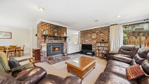 Smart TV, fireplace, DVD player, books